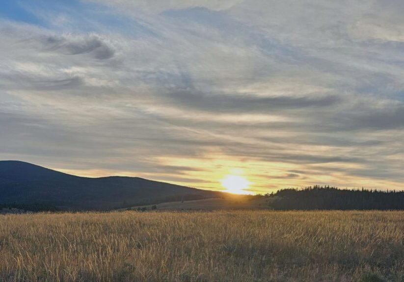 Montana prairie sunset with mountains and open grassland near Billings